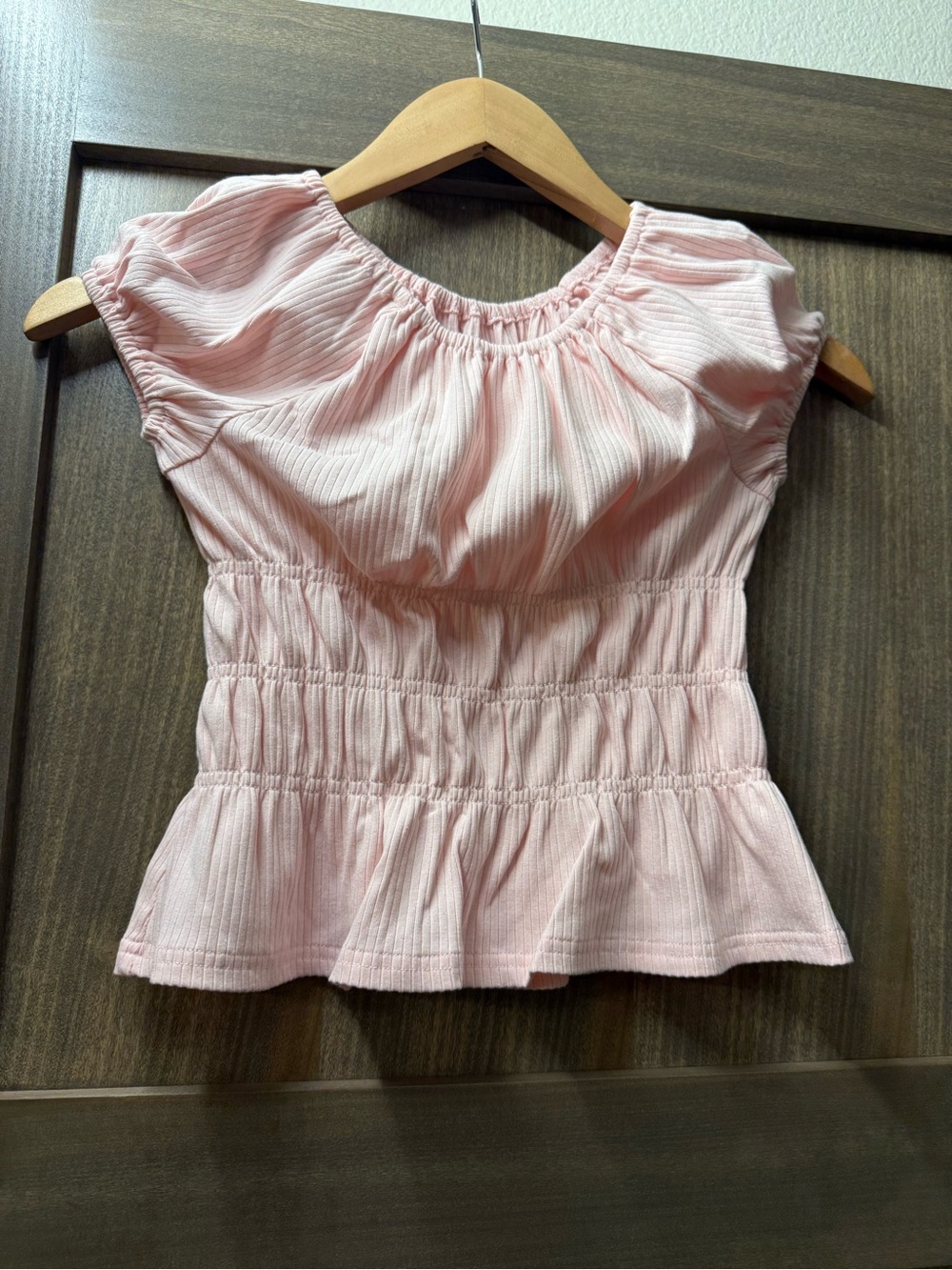 Girl’s Pink Smocked Peplum Top
